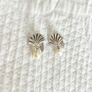 Silver clip on earrings with pearl accent